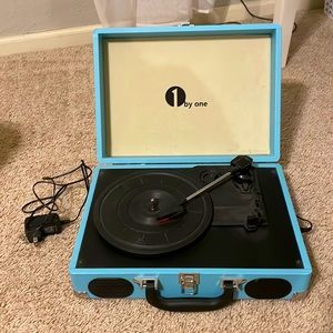 Lightly used bright blue record player